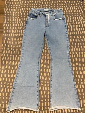 Good American Light Blue High Rise Flared w/raw hem Jeans Sz 10